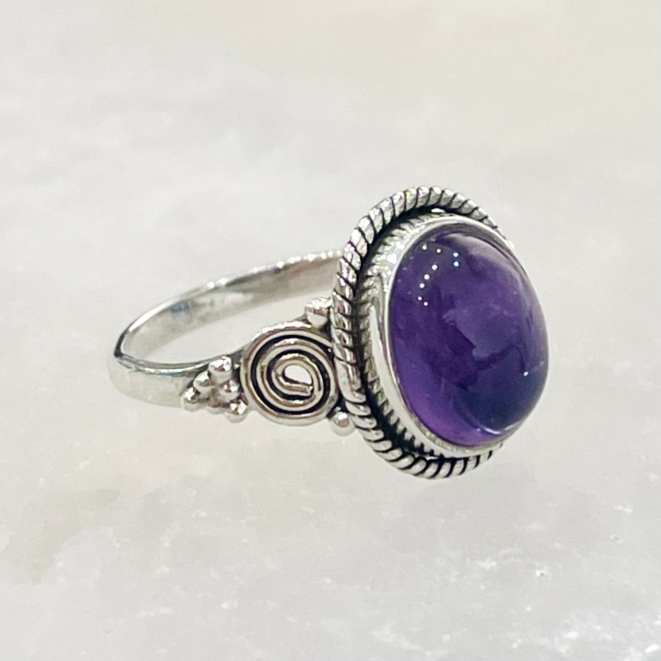 Amethyst swirl detail ring in sterling silver