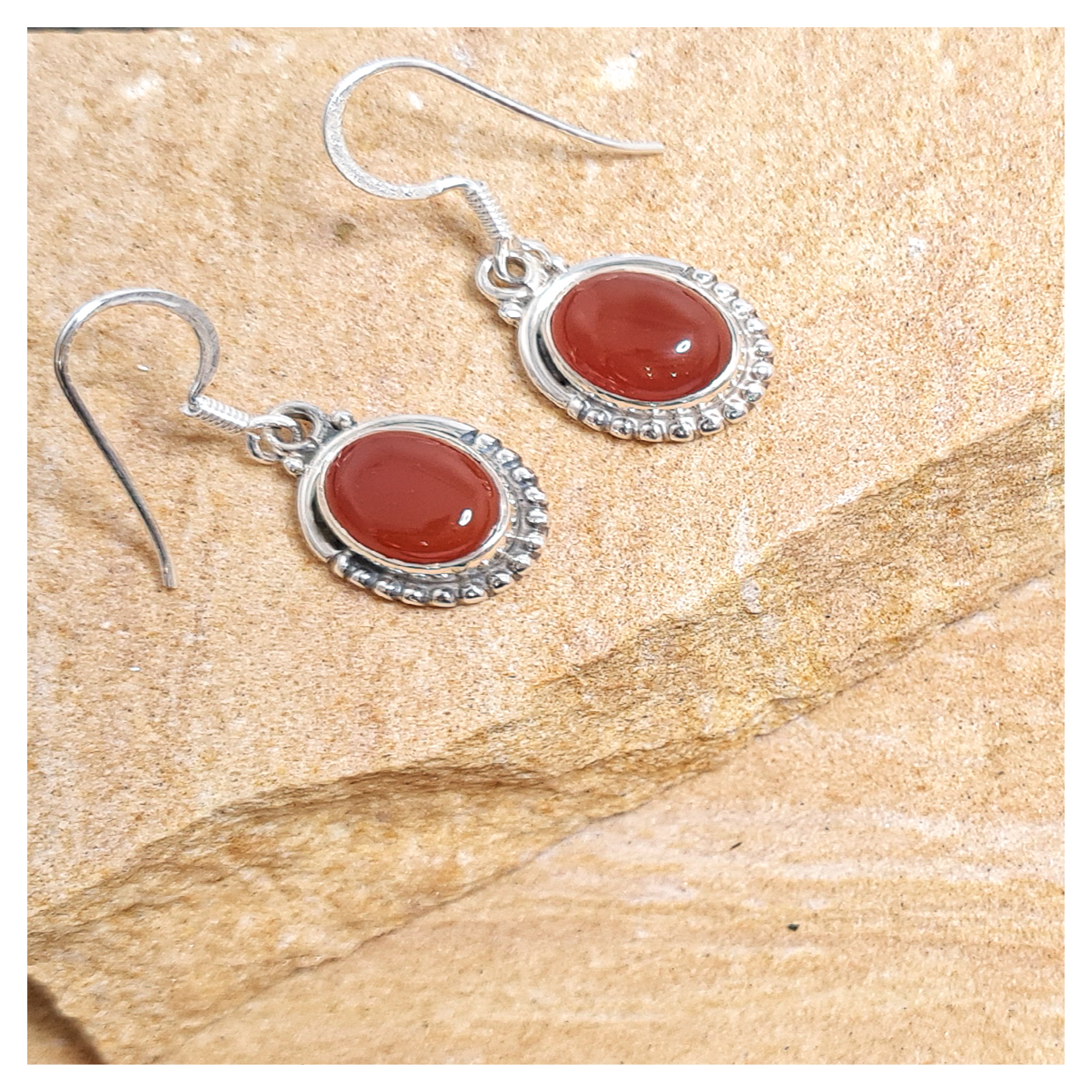 Carnelian oval drop earrings in sterling silver