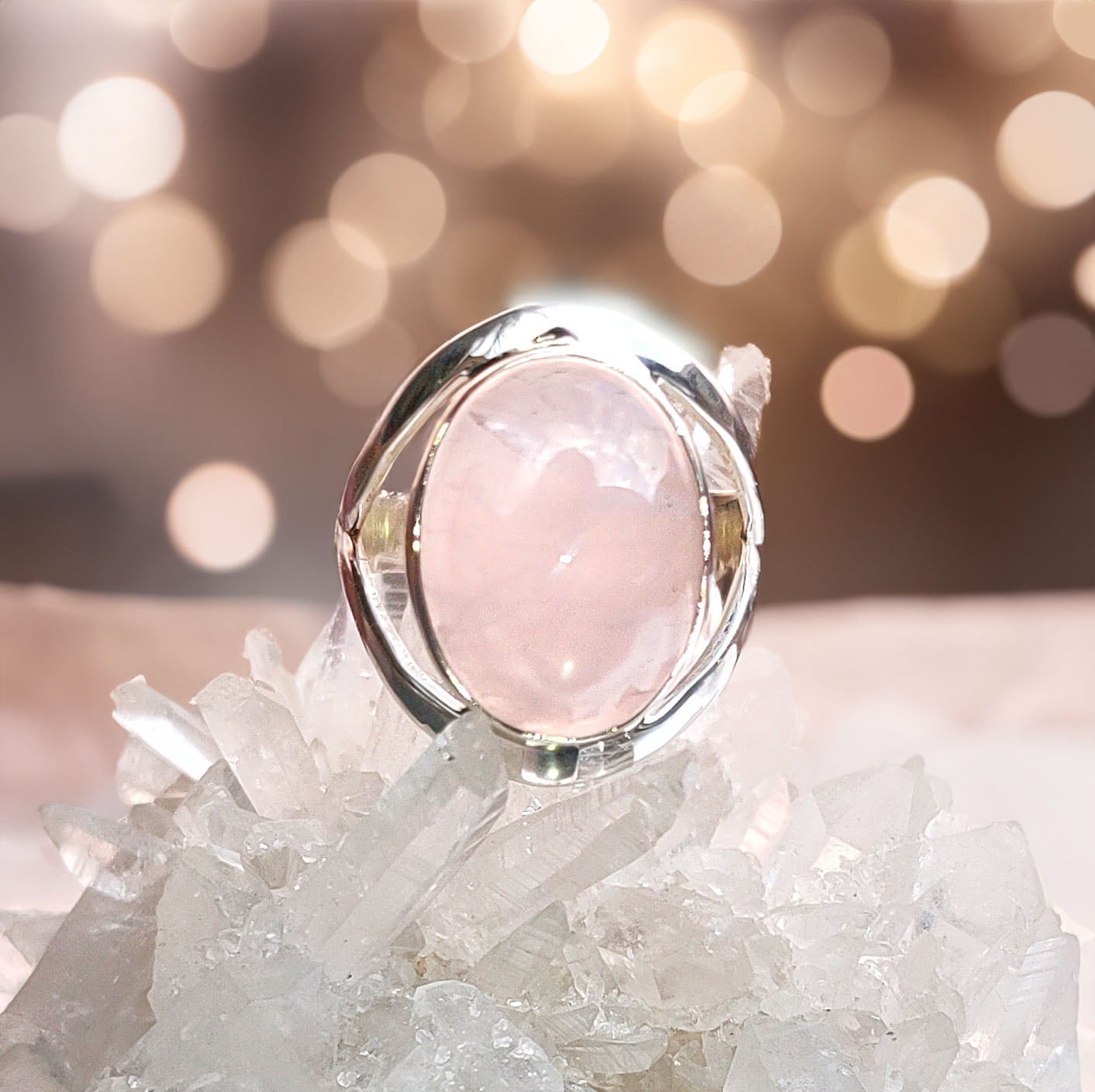 Elegant Oval rose quartz cabochon sterling silver ring