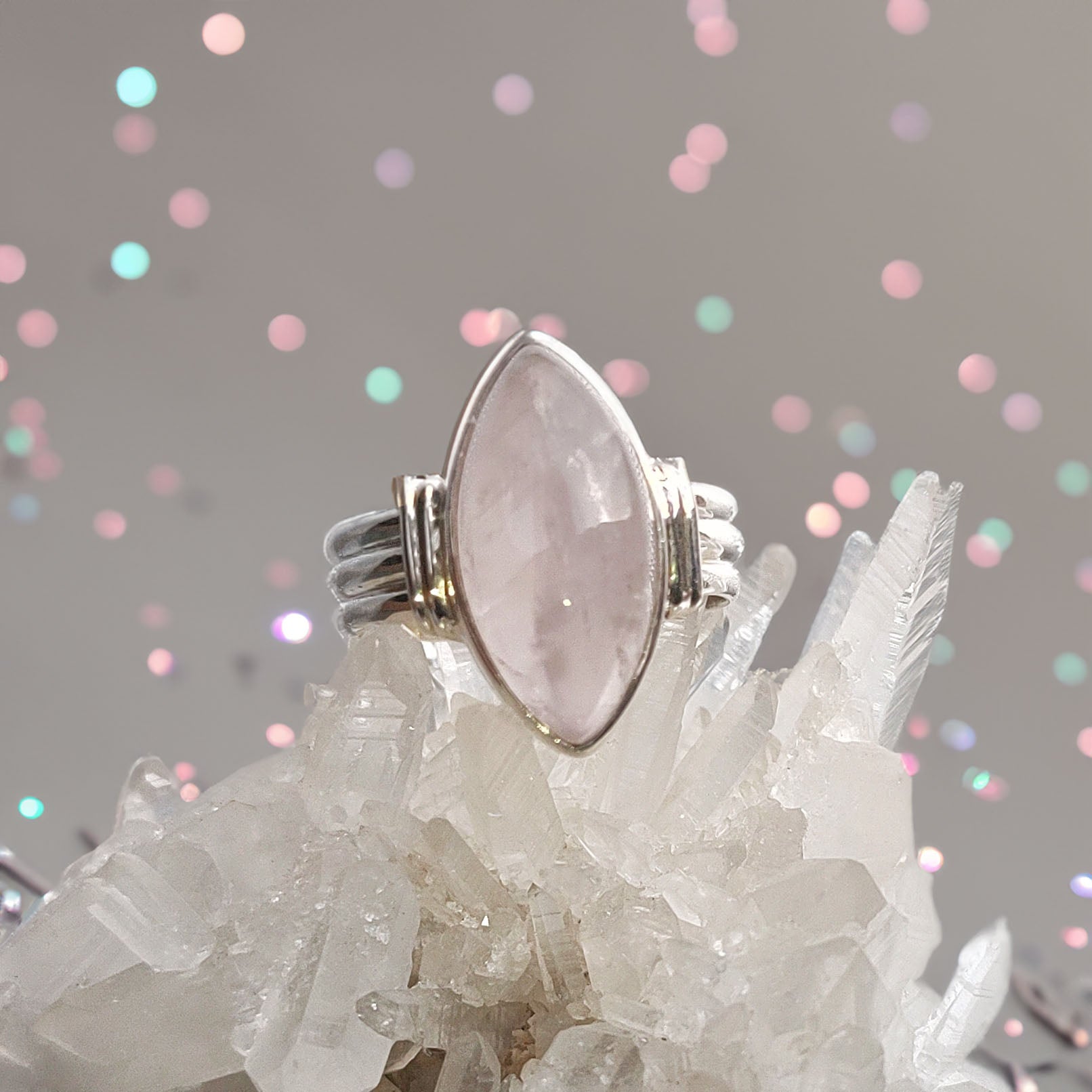 Elegant marquise rose quartz cabochon sterling silver ring